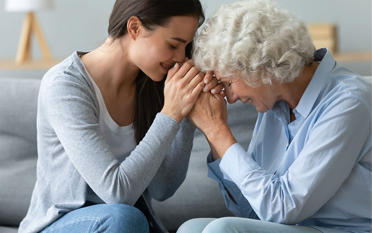 Nurtiring Hands - Old woman secured by her daughter